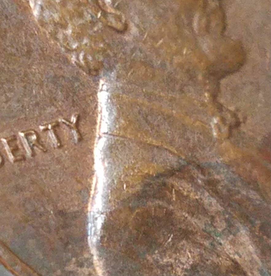 1986-D-Lincoln-Cent-Large-Raised-Bent-Crease-Under-Date?